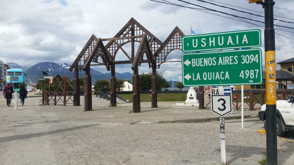 Sign showing distance to Buenos Aires - Ushuaia